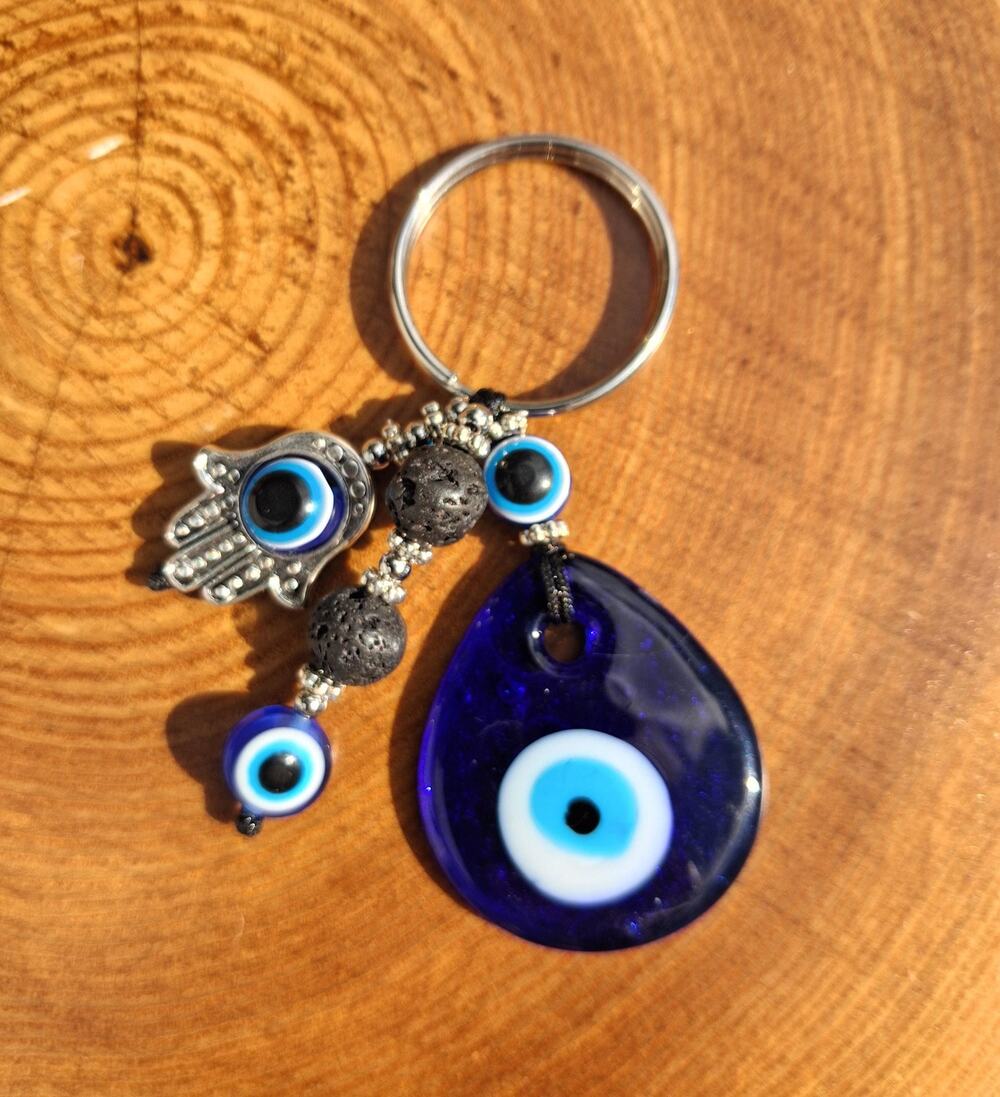 Evil eye keychain protection charm, lava beaded keyring, indigo blue glass eye